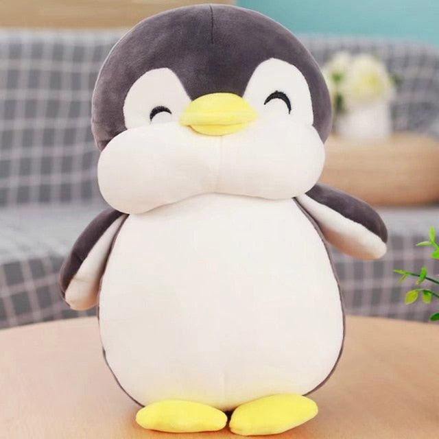 Lächelndes Pinguin-Kuscheltier