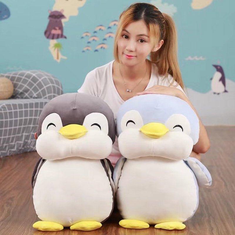 Lächelndes Pinguin-Kuscheltier